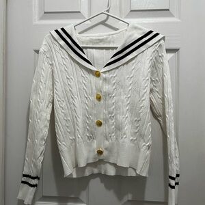 Chic White V-Neck Sweater with Black Stripes